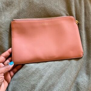 Two toned leather clutch gold hand zipper